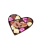 Demi cœur en chocolat noir garni de chocolats