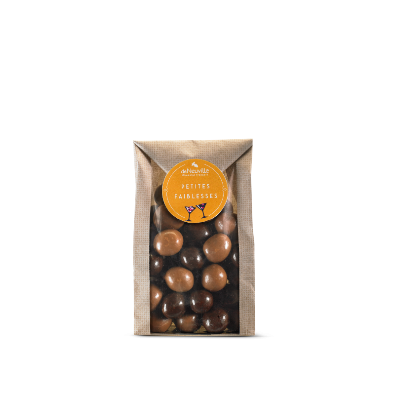 Petit sachet de noisettes entières enrobées de chocolat noir ou lait